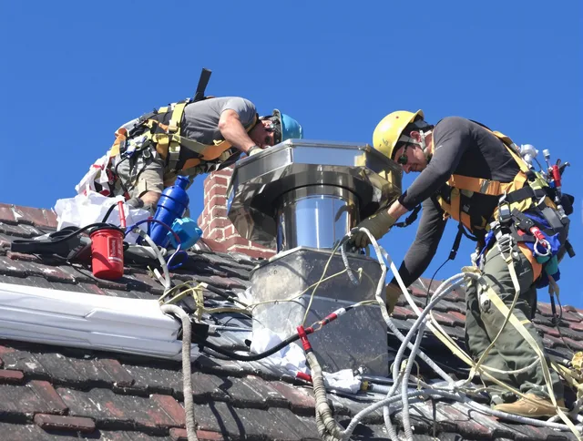 Protective chimney cap installed by Wilmington Chimney Sweep in Wilmington, MA