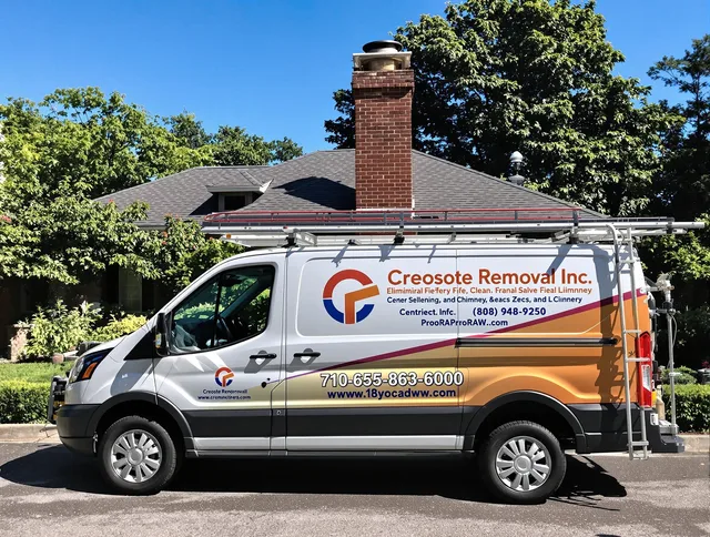 Wilmington Chimney Sweep technician removing creosote safely in Wilmington, MA